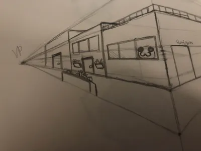 The same drawing in pencil, a house taking shape along the perspective lines